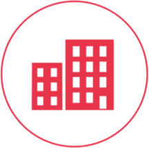 Ein rotes Icon mit einem schmalen Außenkreis, in dem zwei Fabrikgebäude mit Fenstern abgebildet sind.